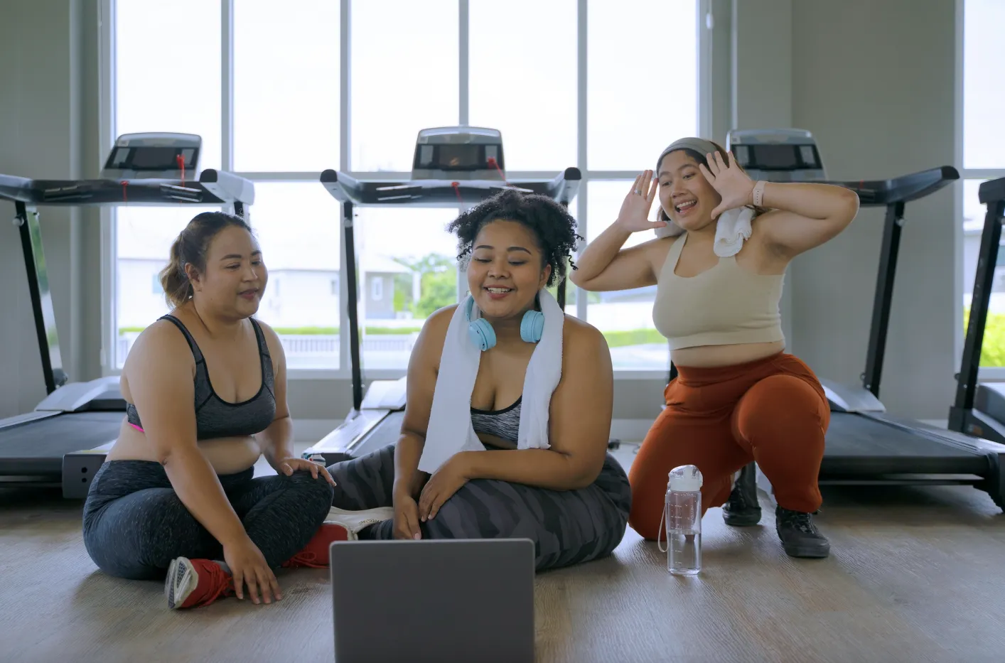 Woman gym workout with screen